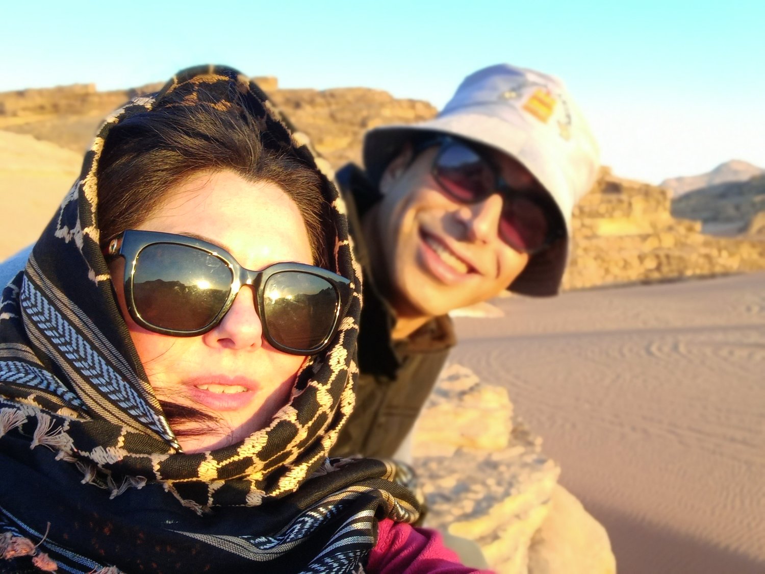 Me (Katherine Al Rashdan) wearing a non-traditional keffiyeh while on a daytrip to Wadi Rum in the South of Jordan. Some women in Jordan wear the keffiyeh to community and family events like parades and weddings.